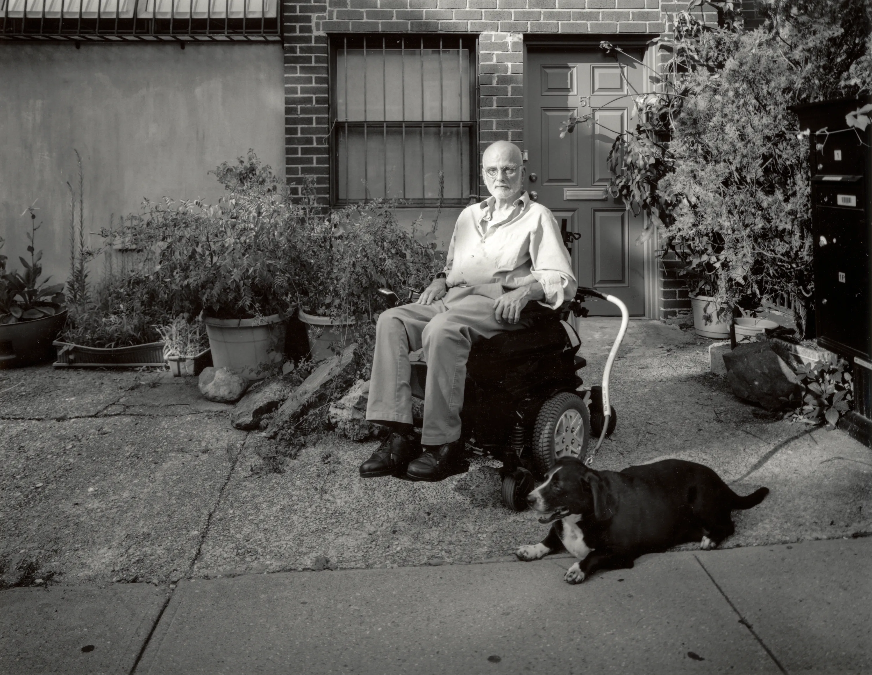 Andy outside of his home with Esmeralda