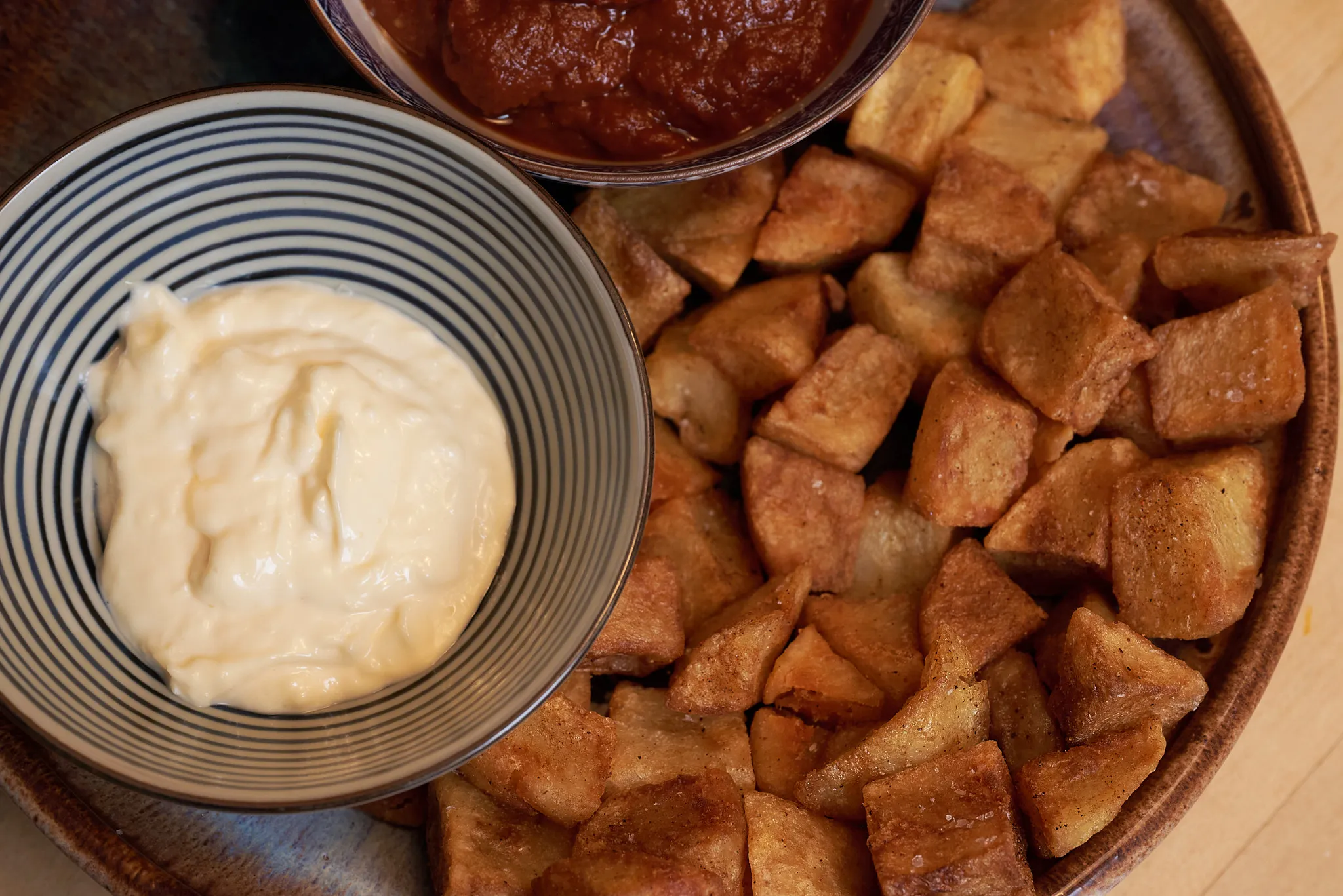 Patatas bravas with chipotle-tomato jam and aioli
